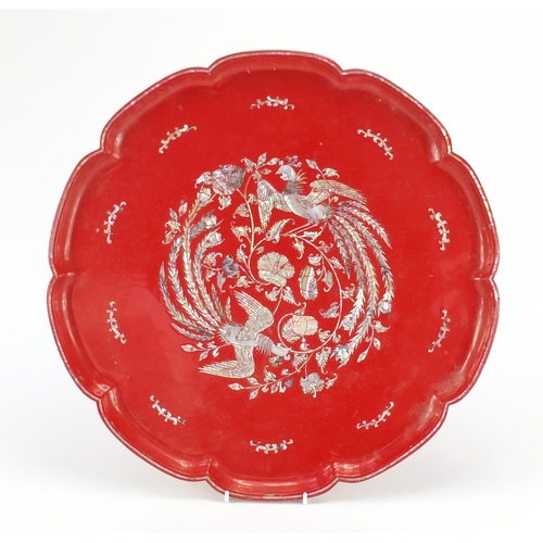 316 - Chinese red lacquered tray with mother of pearl inlay, 46cm in diameter