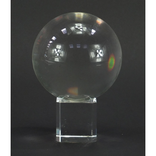 221 - Clear glass fortune tellers crystal ball paperweight on stand, 16cm high