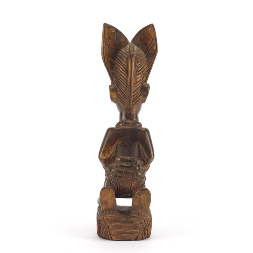 218 - African carved wood figure, 38cm high