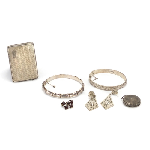 684 - Silver card case and silver and white metal jewellery including bangles and earrings, 90.0g