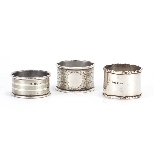 682 - Three circular silver napkin rings, various hallmarks, 63.4g