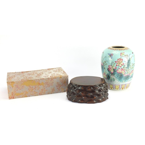 327 - Chinese items comprising porcelain vase, hardwood stand and silk lined presentation box