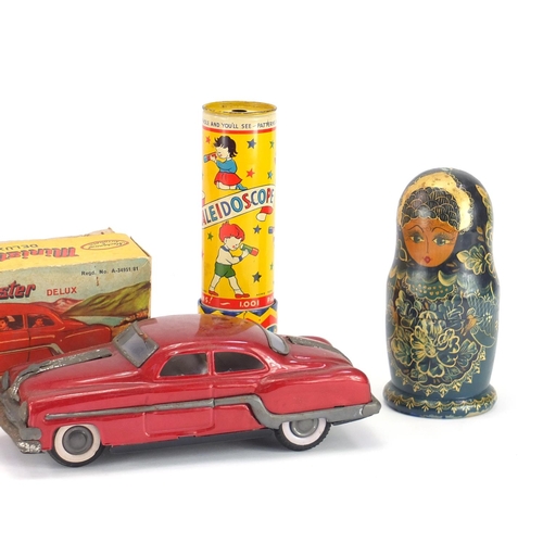 220 - Vintage toys including Minister tin plate car, Russian dolls and two kaleidoscopes