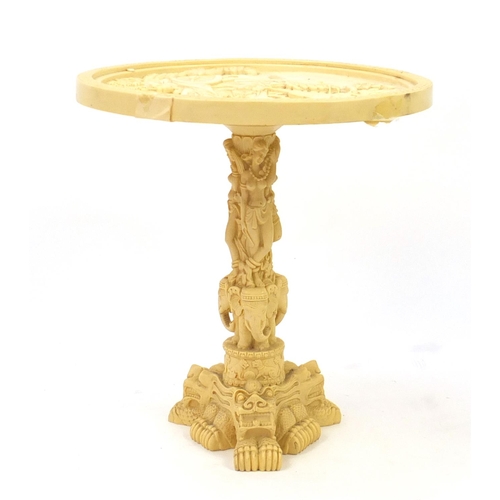 46 - Chinese resin occasional table with elephant and figure column, 49cm high x 46cm in diameter