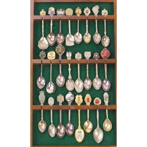 213 - Silver plated souvenir teaspoons, with two display stands