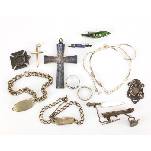 626 - Mostly silver and white metal jewellery including enamelled brooches, cross pendants and identity br... 