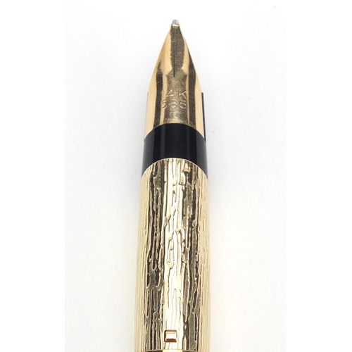 5 - Parker 105 rolled gold fountain pen, having a bark design with 14k gold nib