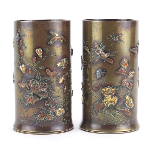 459 - Pair of Japanese Meiji period bronze vases, each decorated with birds amongst blossoming trees, inci... 