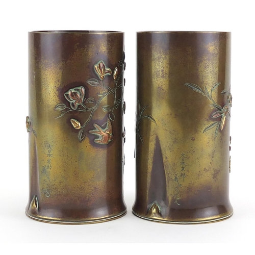 459 - Pair of Japanese Meiji period bronze vases, each decorated with birds amongst blossoming trees, inci... 