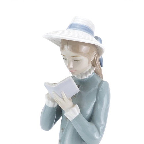 2490 - Large Lladro figurine of a girl reading, numbered 5000, 36.5cm high