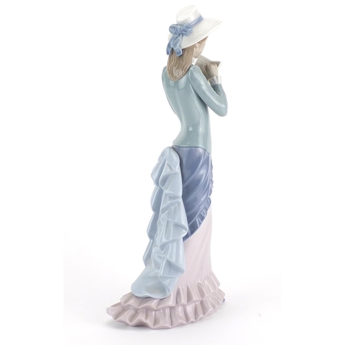 2490 - Large Lladro figurine of a girl reading, numbered 5000, 36.5cm high