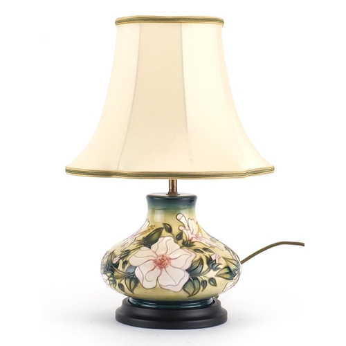 2046 - Moorcroft baluster vase lamp base with silk lined shade, hand painted with stylised flowers, overall... 