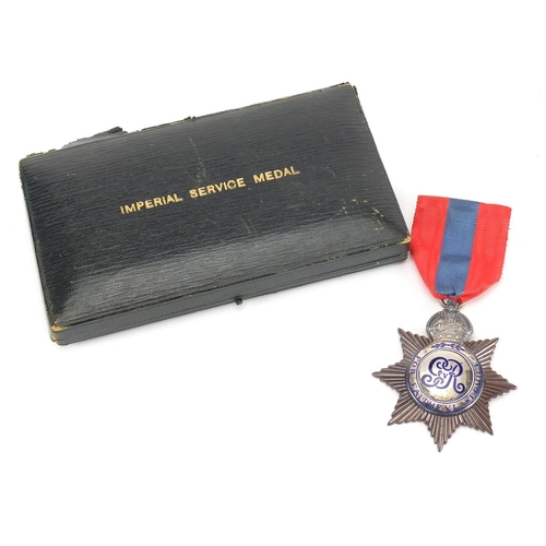 277 - George VR Imperial service medal, awarded to THOMAS R LANGFORD, housed in a tooled leather Elkington... 