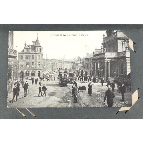 199 - Edwardian and later topographical and social history postcards arranged in an album, some black and ... 