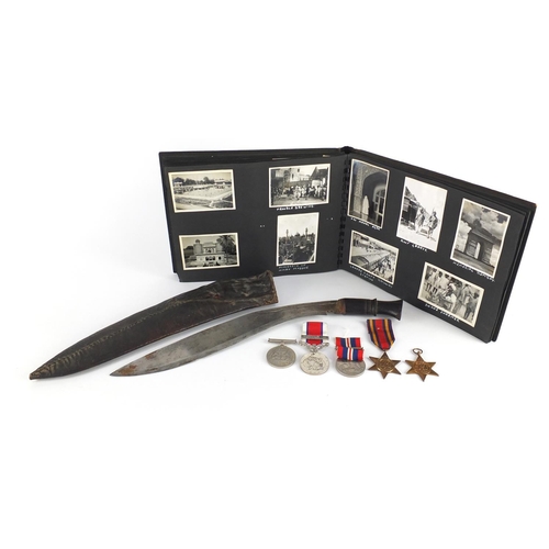 269 - British Military World War II medal group including a photograph album with inscriptions The Taj Mah... 