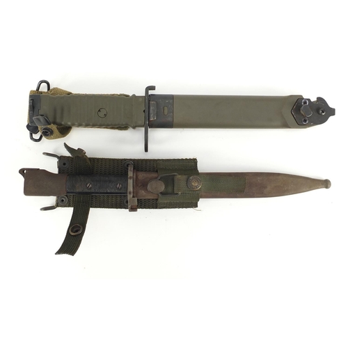 311 - Two American Military interest bayonets with scabbards, one numbered 33709, the largest 34cm in leng... 