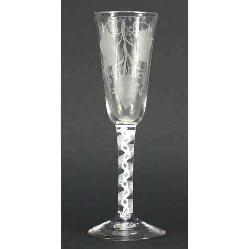 651 - Antique air twist wine glass etched with leaves and berries, 18.5cm high