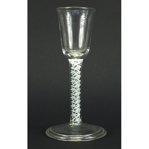 652 - Antique wine glass with air twist stem and folded foot, 16cm high