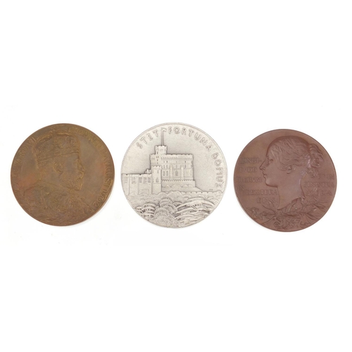 260 - Three commemorative medals housed in fitted cases by The Royal mint comprising King George V Silver ... 