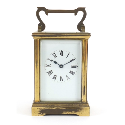 2344 - Brass cased carriage clock with enamelled dial and Roman numerals, 11.5cm high