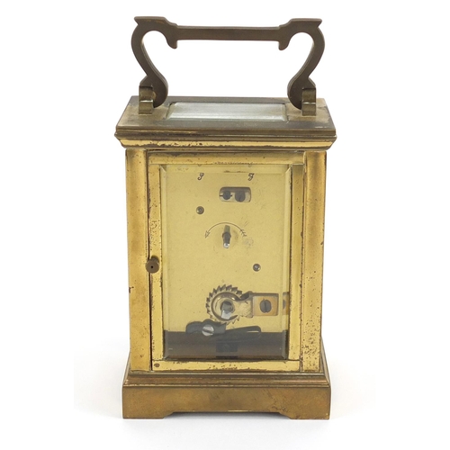 2344 - Brass cased carriage clock with enamelled dial and Roman numerals, 11.5cm high