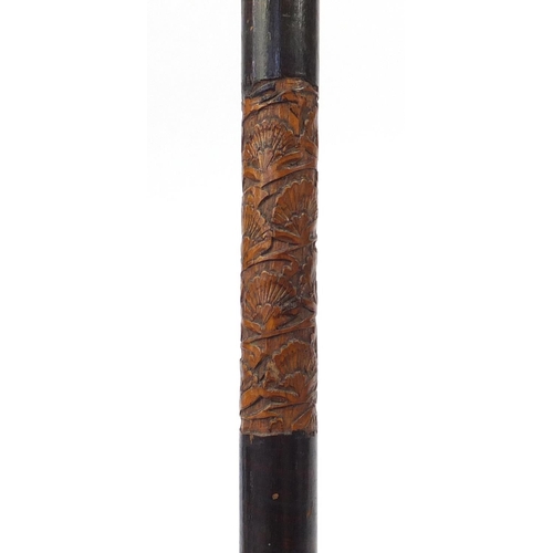 87 - Chinese carved bamboo sword stick with steel blade, 88cm in length