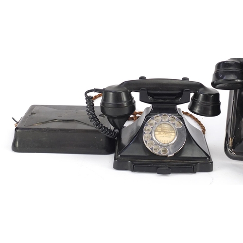 137 - Three vintage black Bakelite telephones including a pyramid example, the largest  20cm high