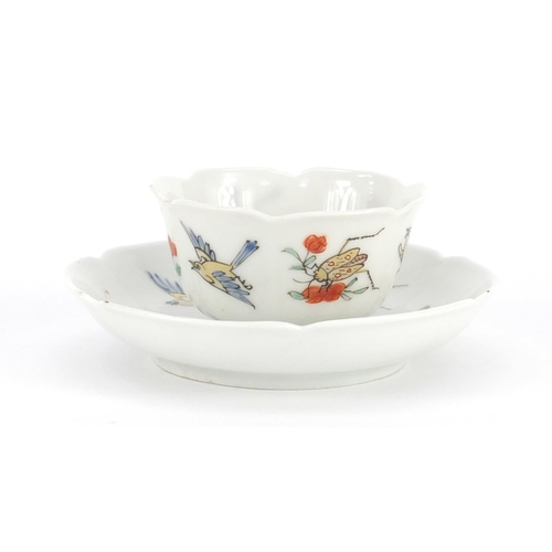 393 - Chinese porcelain tea bowl and saucer, hand painted with birds of paradise and insects, the saucer 9... 