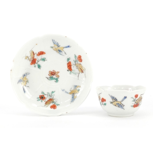 393 - Chinese porcelain tea bowl and saucer, hand painted with birds of paradise and insects, the saucer 9... 