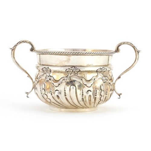 763 - Victorian silver twin handled loving cup with embossed decoration, by W & G Sissons London 1899, 8cm... 