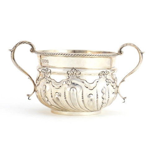 763 - Victorian silver twin handled loving cup with embossed decoration, by W & G Sissons London 1899, 8cm... 