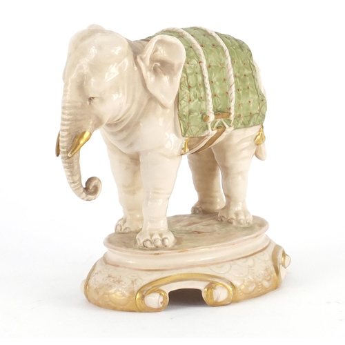 2374 - Hand painted porcelain elephant, possibly Royal Dux, impressed 1014 to the base, 16.5cm high