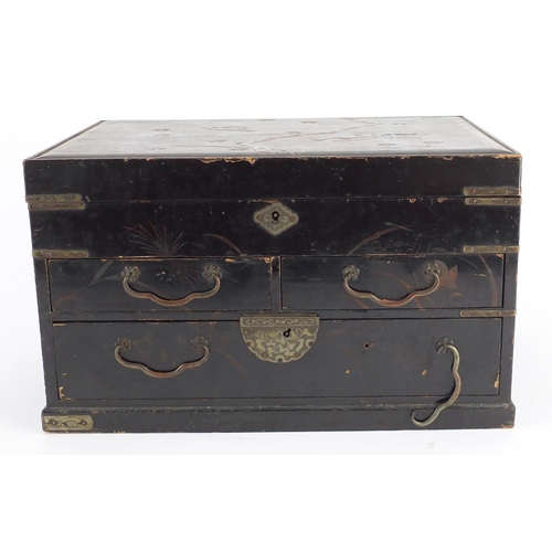 2140 - Japanese lacquered table cabinet with hinged lid, opening to reveal a lift out interior above three ... 