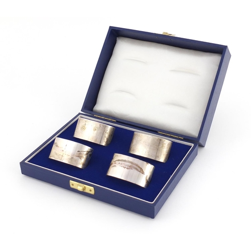 2568 - Set of four oval silver napkin rings, GLB London 1981, with fitted case, 4.8cm wide, 132.2g