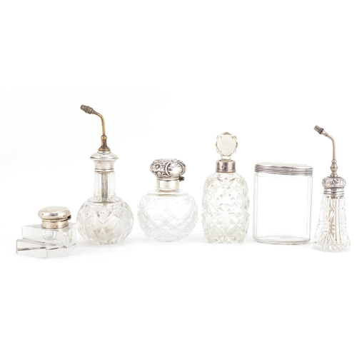 2589 - Five Victorian and later silver mounted glass scent bottles, an atomiser and an inkwell, various hal... 