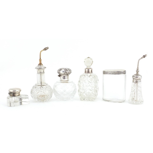 2589 - Five Victorian and later silver mounted glass scent bottles, an atomiser and an inkwell, various hal... 