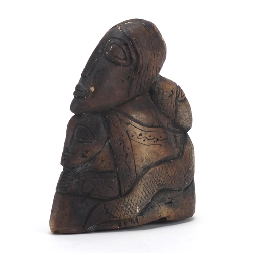 322 - Stone carving of figures and a snake, possibly South American or Inuit, 14cm high