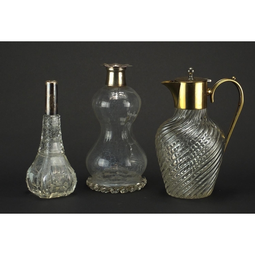 687 - Victorian glass decanter, scent bottle and jug, two with silver mounts