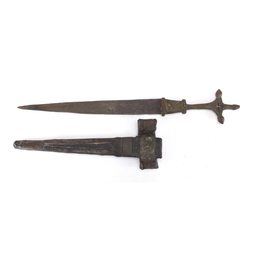 864 - Middle Eastern dagger with brass handle and leather sheath, 49cm in length