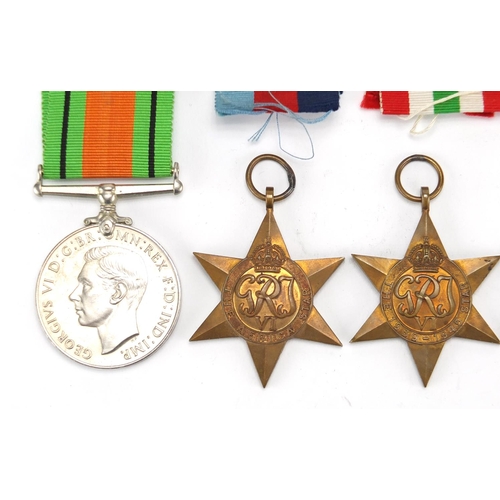 840 - Five British Military World War II medals with ribbons and postage box, for Mr T E D Warne