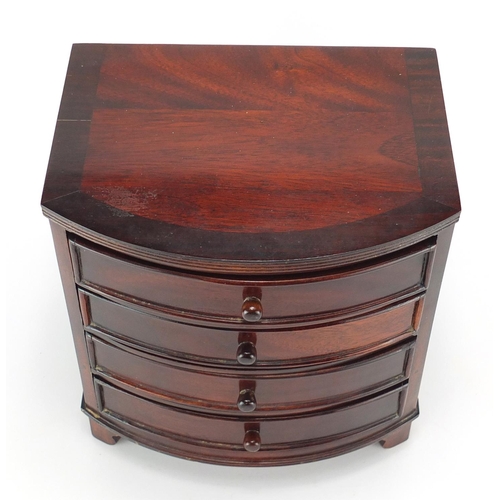 171 - Mahogany  bow front four drawer jewellery chest, 24cm H x 22.5cm W x 18cm D