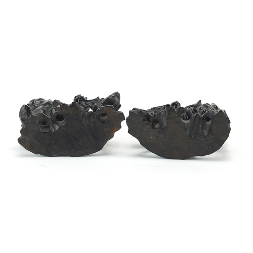 323 - Pair of Chinese carved ebony figures on water buffalo, 15cm high
