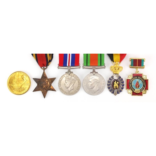 843 - Three British Military World War II medals and three others
