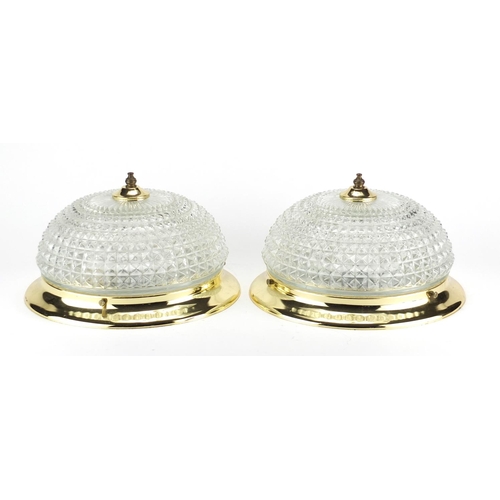 139 - Pair of circular glass and brass light fittings, 29.5cm in diameter