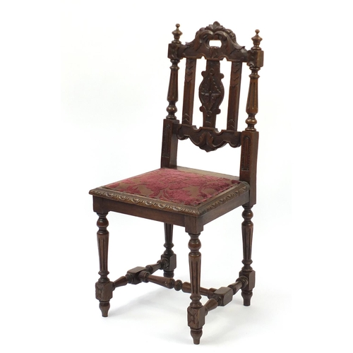 43 - Carved oak hall chair with fluted legs, 98cm high