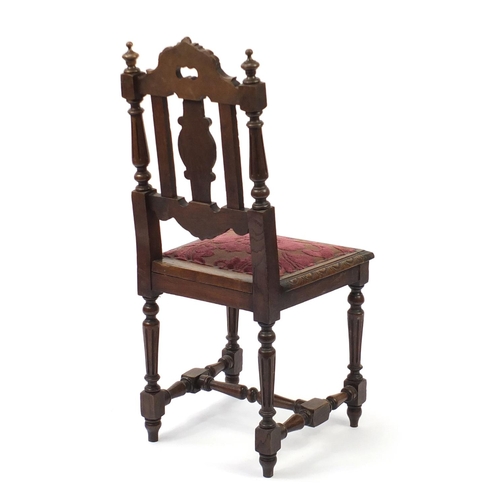 43 - Carved oak hall chair with fluted legs, 98cm high