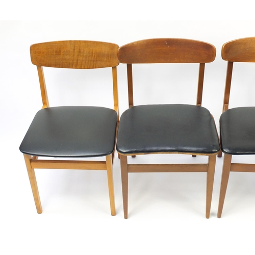 4 - Set of eight vintage teak chairs with black leatherette seats, in the style of Kofod Larsen, 76cm hi... 