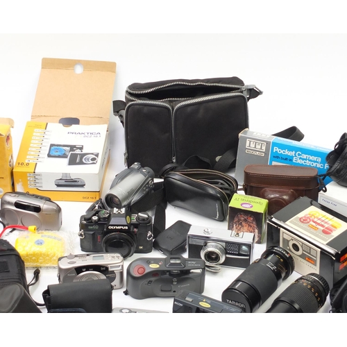 390 - Vintage and later cameras, camcorders, lenses and accessories including Canon, Zeiss Ikon, Kodak and... 