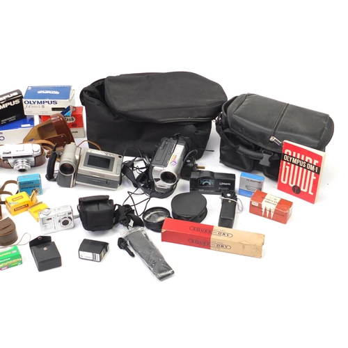 394 - Vintage and later cameras, camcorders, lenses and accessories including Samsung, Sharp, Zenit, Agfa ... 