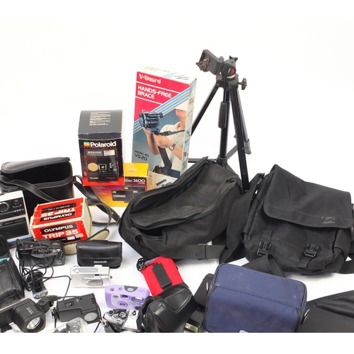 396 - Vintage and later cameras, camcorders, lenses and accessories including Pentax, Panasonic, Olympus, ... 